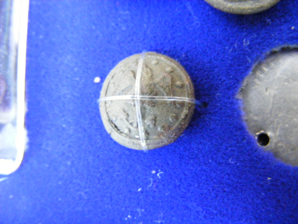 A Navy button.